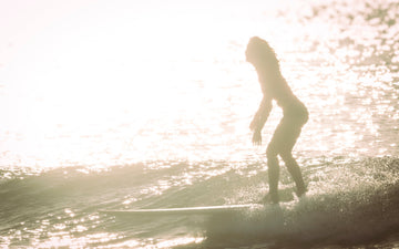 a girl surfing in the 2025 Queen of the Point in Malibu