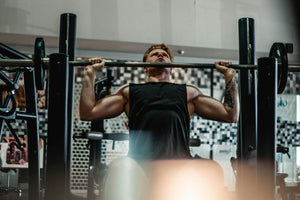 A man lifting weights Happy Faced