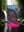 Colorful towel with a graphic design in a natural setting with a waterfall