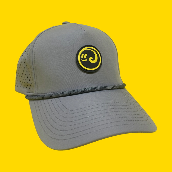 Gray rope cap with a yellow Happy Faced Towels logo on a yellow background